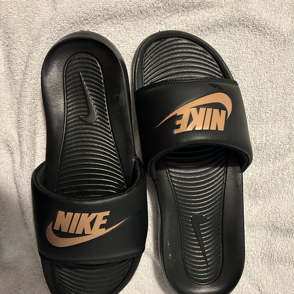 Nike Black and Gold Logo Slides